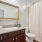 a bathroom with a large mirror