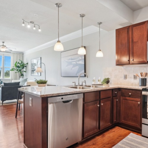 Spacious and Open Kitchen and Living Room Spacious kitchen with stainless steel appliances